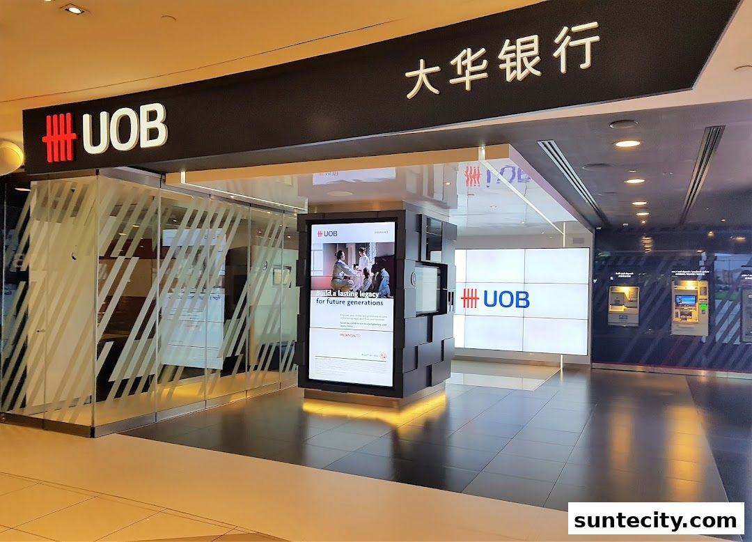 The UOB bank branch entrance with signage and digital displays.