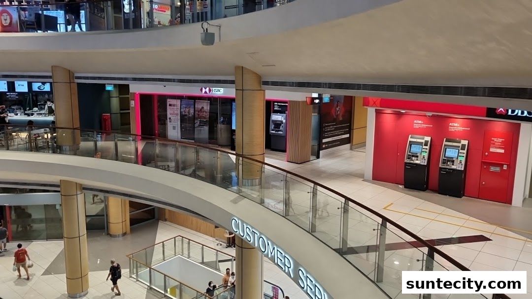 Interior view of a shopping mall with HSBC and DBS ATMs and a customer service area.