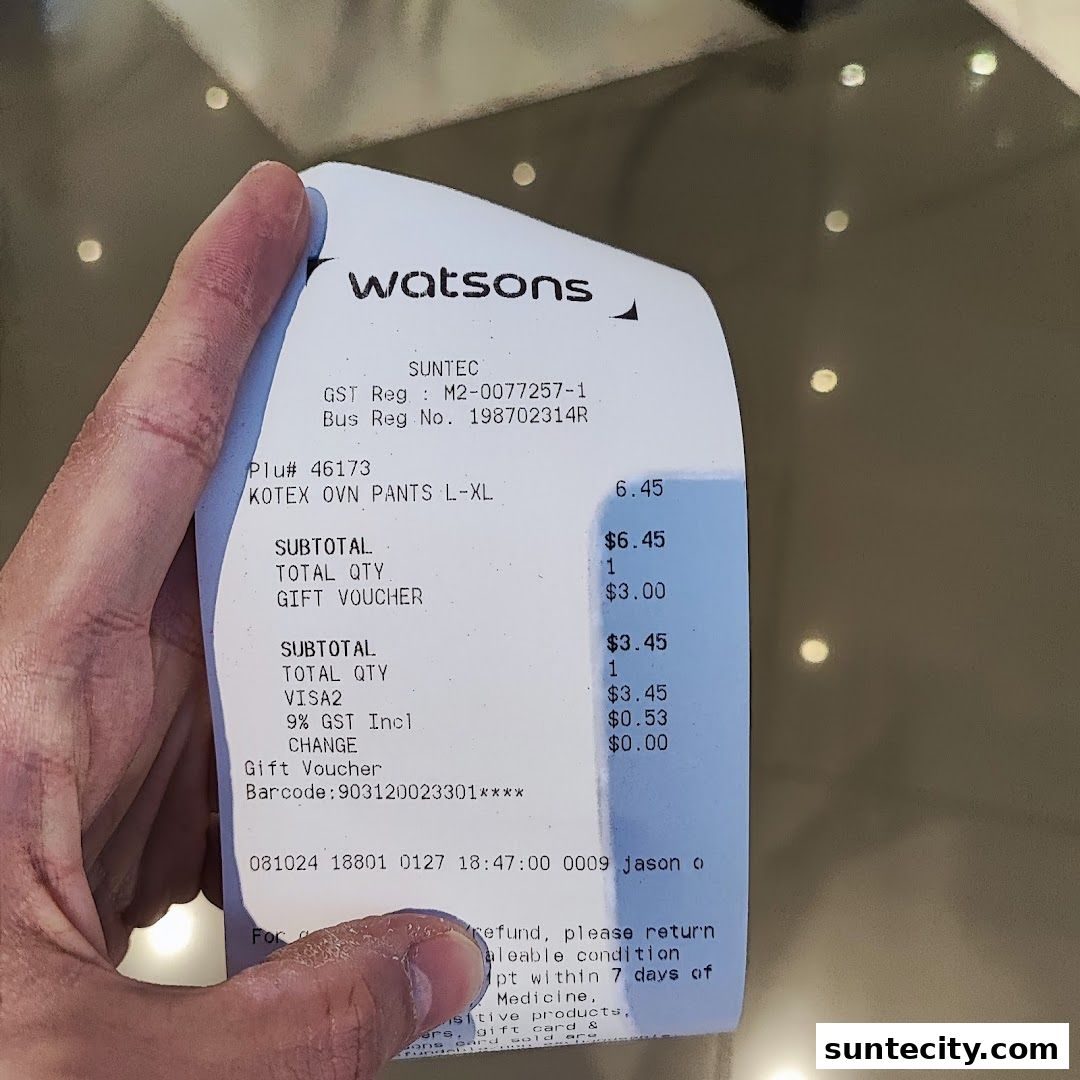 A Watsons receipt showing a purchase of Kotex pants and payment details.
