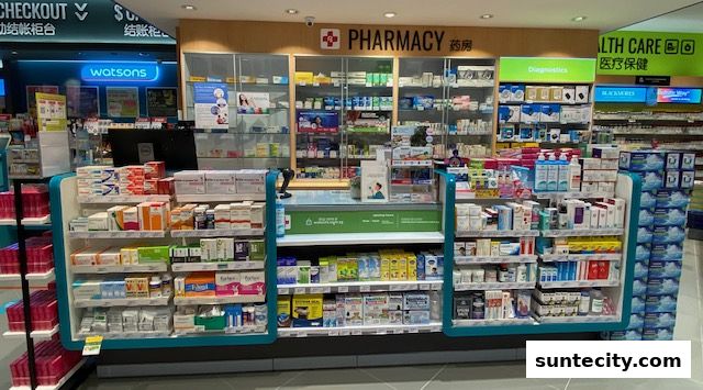Interior view of a Watsons pharmacy and GNC store with shelves stocked with health and beauty products.