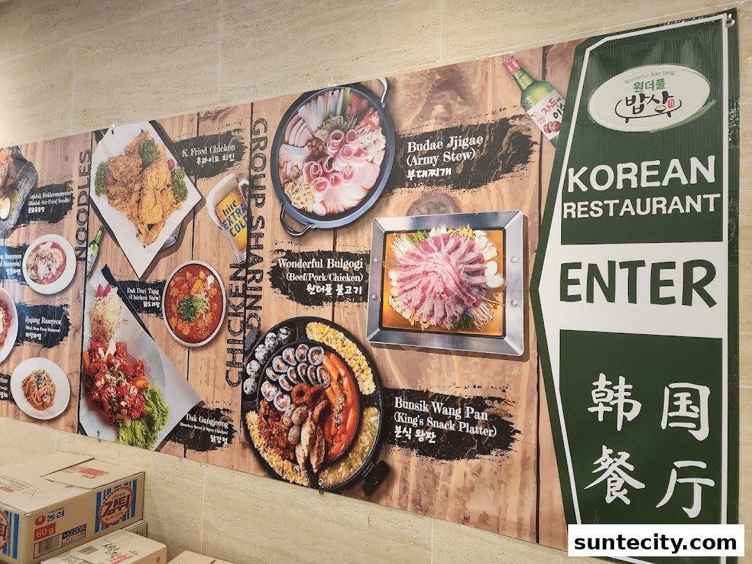 A wall display showcasing various Korean dishes offered at Wonderful Bap Sang.
