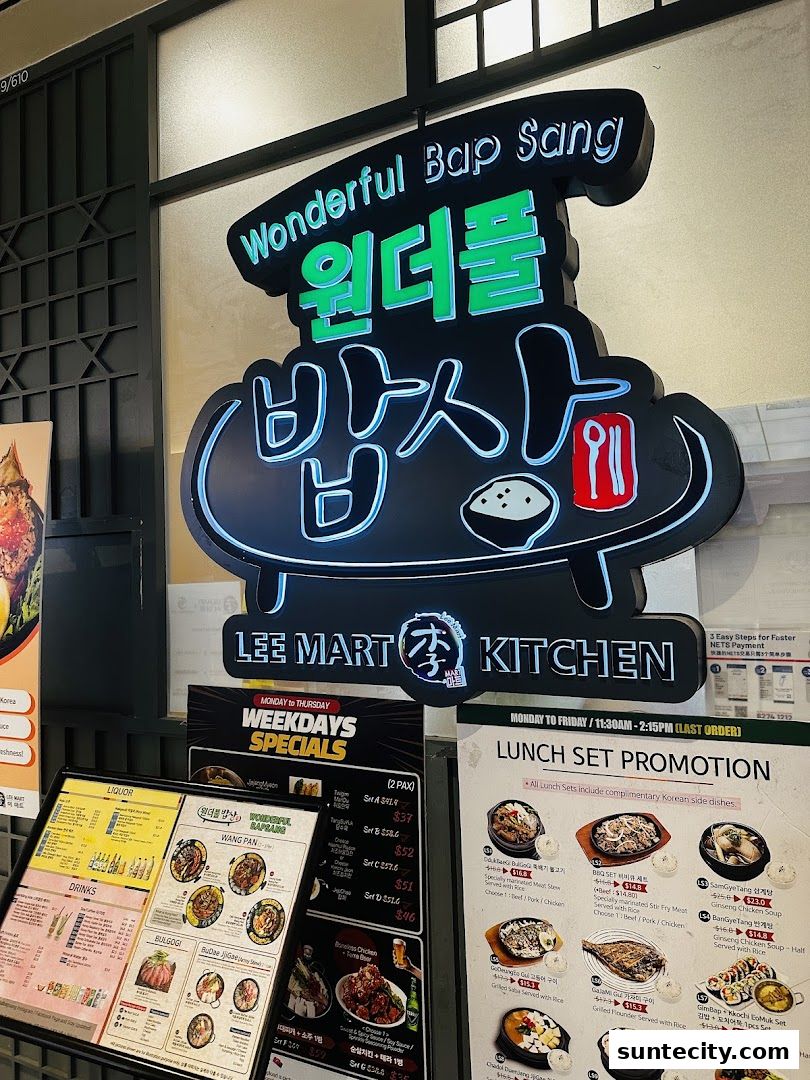 A sign for Wonderful Bap Sang restaurant, with menus displayed below.