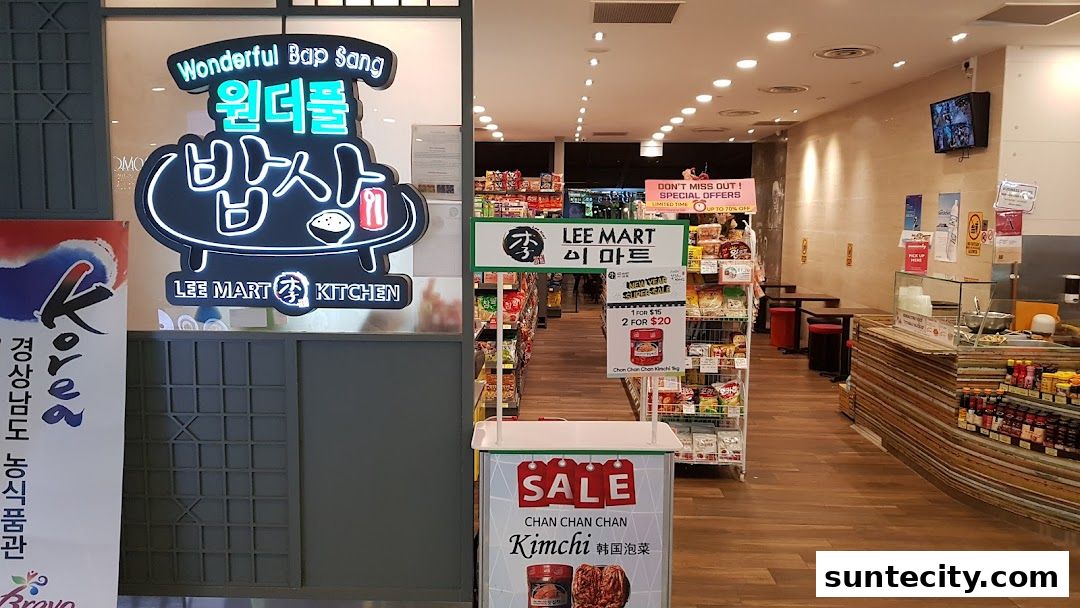 The exterior of a Korean food shop called Wonderful Bap Sang, with a display stand outside.