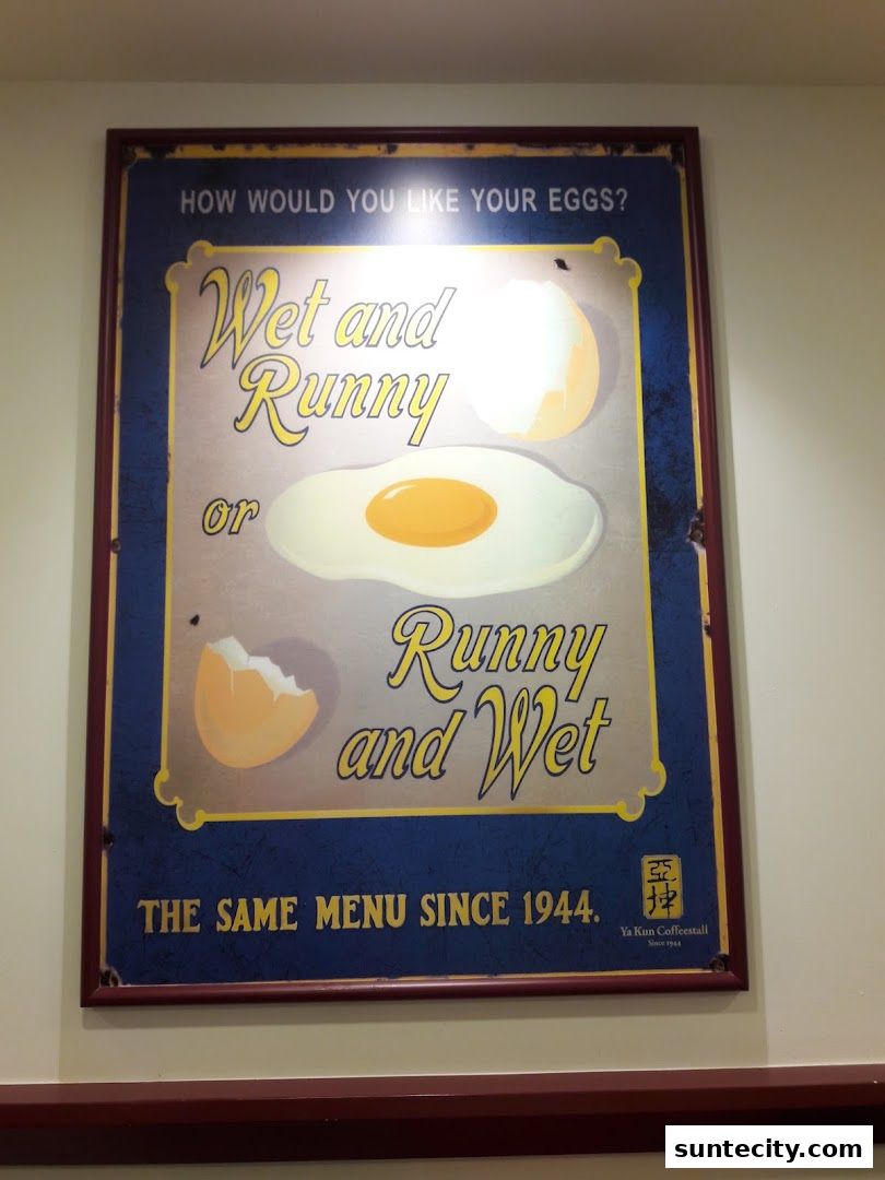 A vintage-style sign for Ya Kun Kaya Toast, asking how customers like their eggs.