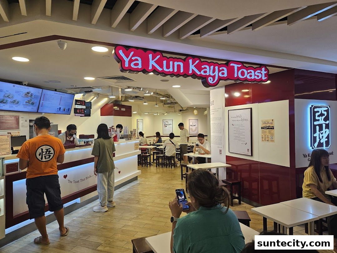 Interior of Ya Kun Kaya Toast with customers ordering and dining.