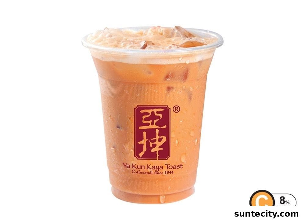 A refreshing iced Thai milk tea with the Ya Kun Kaya Toast logo and 8% sugar indication.