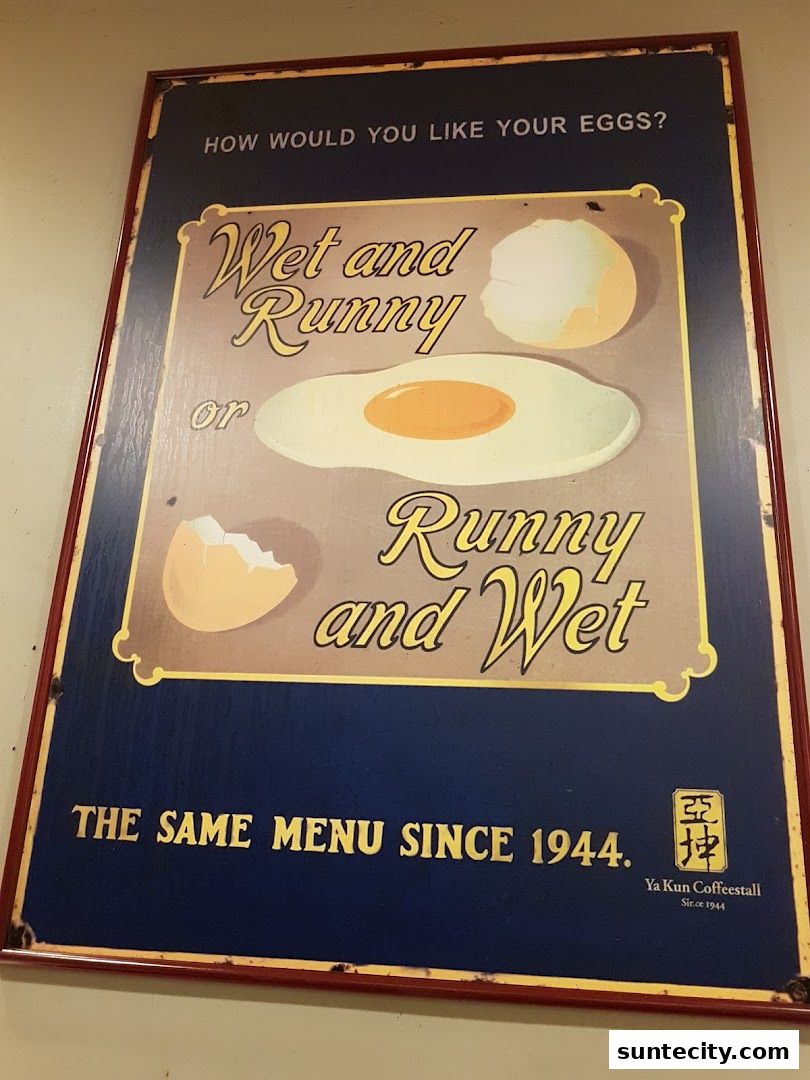 A vintage-style sign for Ya Kun Kaya Toast, advertising how customers like their eggs.