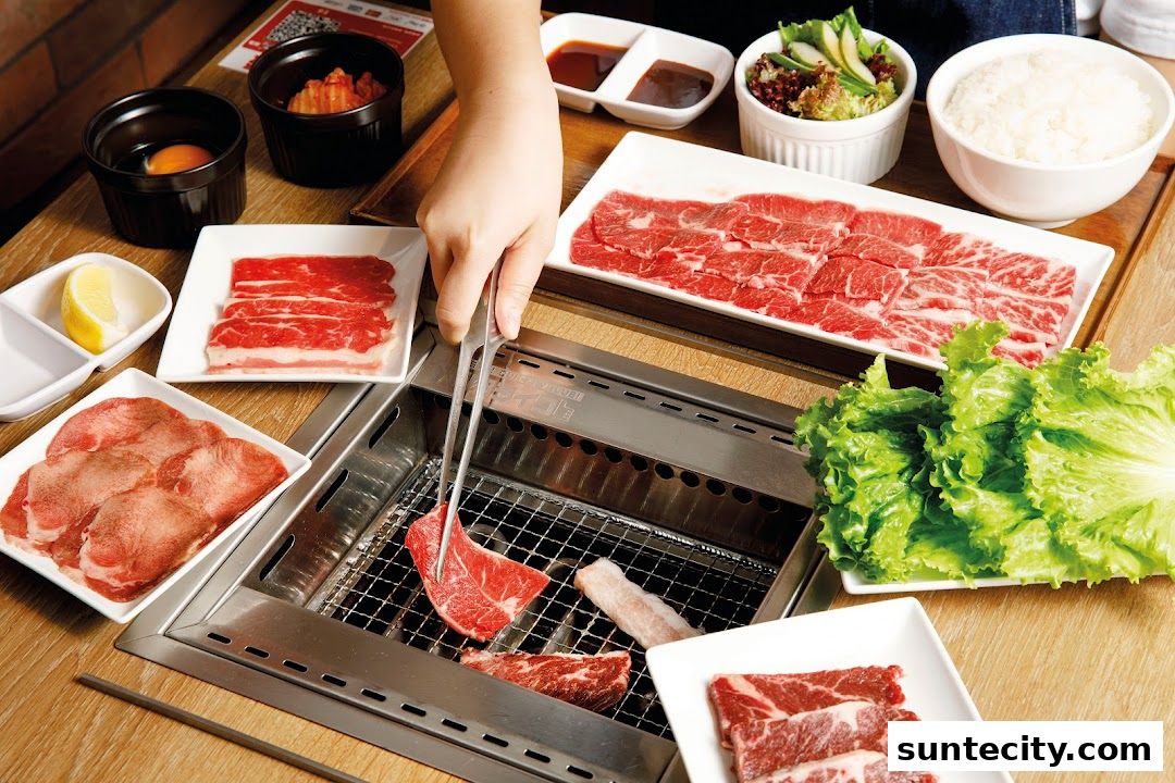 A person grilling thinly sliced beef and other ingredients at a Yakiniku restaurant.
