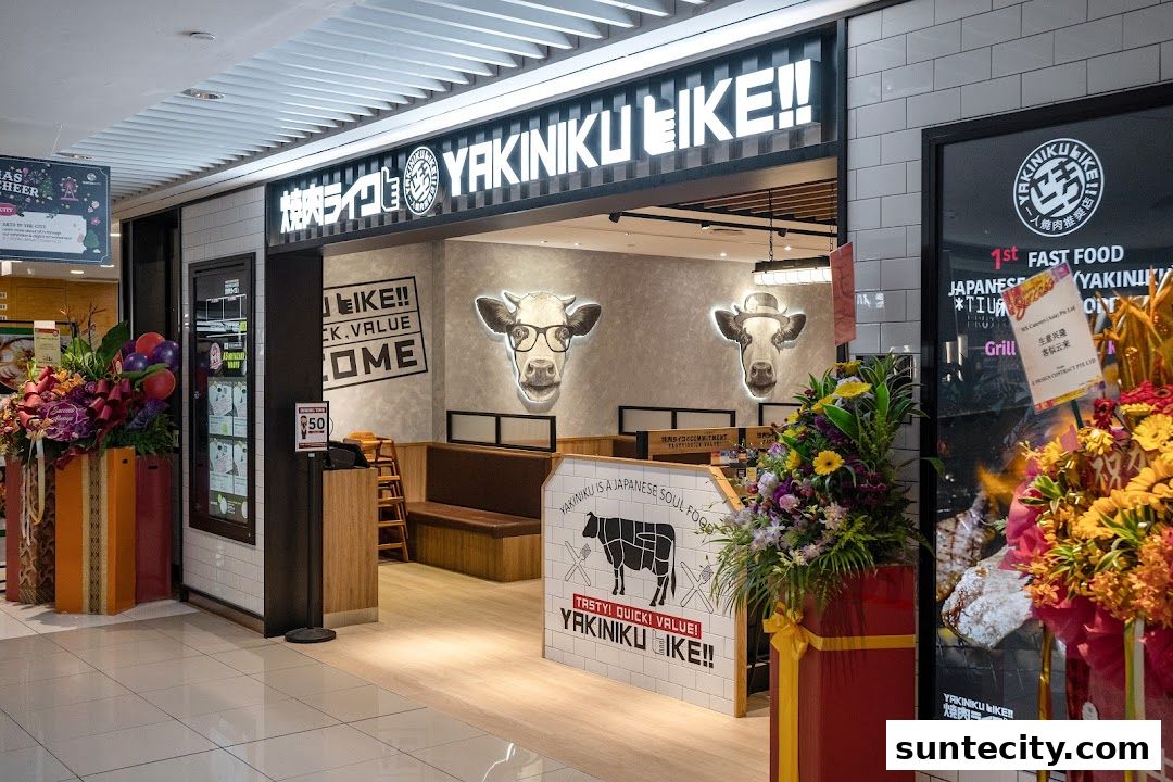 The entrance of Yakiniku Like, a Japanese BBQ restaurant, with decorative flowers and cow imagery.